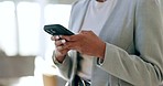 Closeup, business and woman with a smartphone, hands and typing with social media, message and chatting. Female person, employee and cellphone with mobile app, contact and network with connection