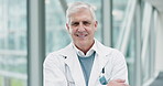 Face, senior doctor and man with arms crossed in hospital for healthcare, wellness or insurance. Medical professional, portrait and confident surgeon, happy or expert smile from Switzerland in clinic