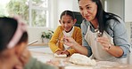 Baking, family and learning of kids with mother showing cookie shakes in a kitchen. Home, support and mama with cooking and children together with child teaching and food to bake dessert in a house