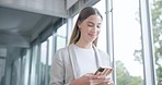 Smile, walking and a woman with a phone at work for communication, email or reading a notification. Social media, happy and a corporate employee in an office with a mobile for an app or the internet