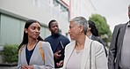 City discussion, walking and business women, intern lawyer or senior advocate on morning trip, job commute or travel. Team, consulting advice and corporate people talking on outdoor journey to work