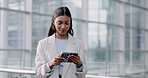 Phone, business and Indian woman in office online for social media, networking and internet. Professional, corporate manager and female person on smartphone for contact, website and typing email