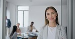 Business woman, arms crossed and portrait in office at creative advertising agency with smile. Happy, female employee and professional in a workplace ready for team meeting with confidence at work