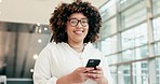 Woman, face and walking in office with smartphone for social network, mobile website and digital contact. Portrait of happy worker typing on cellphone, reading business notification and app in lobby