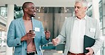 Business men, walk and greeting with hands, fist bump or handshake in office for teamwork. Diversity friends, partner or entrepreneur people together for respect, collaboration and trust or support