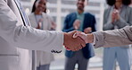 Handshake, applause and business people in partnership for deal, support and celebration for success. Collaboration, shaking hands and group clapping for b2b agreement, acquisition or congratulations