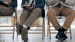 Recruitment, job interview and shoes of business people in waiting room for hiring, meeting and process. Career, lobby and community with closeup of employee for support, human resources and teamwork