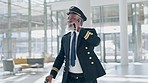 Airport, pilot man and phone call on walk, lobby or smile for talk, flight schedule or international transport. African airline worker, suitcase and global travel with airplane, smartphone or chat