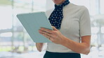 Tablet, airport and hands of flight attendant scrolling for travel schedule online, internet or website at terminal. Information, technology and employee check international or global business class