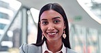 Happy, confidence and face of businesswoman in the office with smile, pride and success. Vision, career and headshot portrait of a professional young female corporate lawyer in a modern workplace.