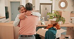 Smile, moving house and a senior couple hugging in their new home while unpacking boxes for relocation. Real estate, living room and keys with an elderly woman embracing her husband in an apartment