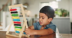 Education, math and child with abacus for learning, studying and teaching for development. Creative, school and boy at table in home for knowledge, counting and academic lesson with educational toy