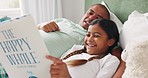 Bed, girl and father reading a book, smile and home with happiness, quality time and fantasy with education. Family, female kid and male parent with child, storytelling in a bedroom and creativity