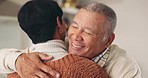 Senior couple, hug and man closeup at home with love, marriage and retirement in lounge. Support, happy care and romance with smile and romantic embrace of a elderly woman relax together in house