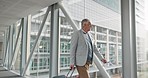 Old man, walking and travel for work, airport and corporate conference with executive on business trip. Male CEO, journey and happy, professional convention and luggage, ready for flight and smile