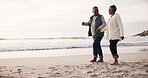 Couple, walking and holding hands on the beach, vacation and holiday to a tropical island in retirement or travel with love. Happy, elderly people and walk on sand together with happiness in marriage