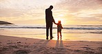 Beach, father and son holding hands, sunset and adventure with love, quality time or happiness. Male parent, boy and kid on a seaside holiday, vacation and tropical island getaway with care and ocean