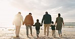 Beach, sunset and big family holding hands while walking together on vacation, holiday or adventure. Love, travel and boy children bonding with grandparents and parents by the ocean on a weekend trip
