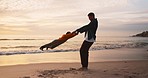 Beach, man spinning child and playful sunset holiday in Australia with freedom, fun and energy. Travel, swinging and happy father and kid with smile, playing and bonding together on ocean vacation.