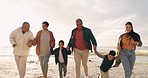 Beach, holding hands and big family running with energy together on vacation, holiday or adventure. Happy, love and boy children bonding with grandparents and parents by the ocean on a weekend trip.