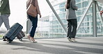Business people, walking and travel, airport and suitcase with corporate conference or commute with professional trip. Employees, arrival or departure with company convention with luggage and journey