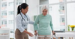 Rehabilitation, walker or doctor walking with old woman in retirement or hospital for wellness or support. Physio, nurse helping or elderly patient learning with frame in physical therapy recovery