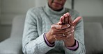 Senior woman, hands and arthritis in closeup, massage and physical therapy for injury in nursing home. Elderly person, joint pain or osteoporosis with retirement in house, rub and stretching fingers