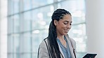 Business woman, tablet and smile with email of a lawyer with app and social media scroll. Office, female attorney professional and legal work with technology in a company and law firm working on tech