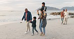 Parents, boy kids and beach with grandparents, walk and care with love, talking or bonding outdoor for vacation. Young children, twins and piggyback with mom, dad or family together for ocean holiday