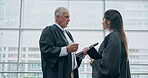 Judge, mentor and training a lawyer talking or planning criminal case investigation strategy together as teamwork for justice. Communication, conversation and legal professional speaking to attorney