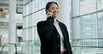Phone call, business woman and walking in airport for travel, communication or chat. Mobile, conversation and happy person in lobby with smartphone for discussion, networking and speaking to contact