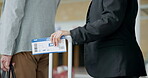 Ticket, queue and people at an airport for travel, holiday or vacation while waiting in line. Closeup of passenger group with luggage, suitcase or baggage for a flight or accommodation at a hotel