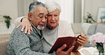 Bible, God and a senior couple reading a book in their home together for religion, faith or belief. Love, Jesus or Christ with a spiritual man and woman in worship or prayer during retirement 