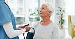 Old woman patient, doctor and blood pressure check, cardiovascular healthcare and elderly care. Help, trust and support with communication, people in clinic with hypertension and wellness assessment 