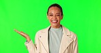 Green screen, hand holding and woman face in studio for promo, info or announcement on mockup background. Happy, portrait and female model show news, review or feedback, deal or prize giveaway