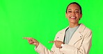 Green screen, hand pointing and woman face in studio for promotion, information or announcement on mockup background. Happy, portrait and female model show news, review or feedback, deal or giveaway