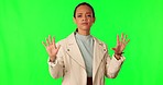 Woman, doctor and no hand wave with face and green screen with stop and medical disagree. Female professional, portrait and studio with rejection, decline and bad choice gesture for healthcare tips