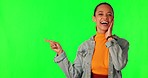 Green screen, smile and woman surprise, pointing or shocked facial expression over promotion deal, sales news or discount. Wow mockup space, chroma key portrait or person gesture on studio background