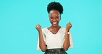 Face, woman and applause with fist in studio to celebrate success, yes and winning lotto on blue background. Portrait, happy african model and clapping for celebration, bonus goals or pride of winner