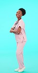 Black woman, flex and doctor face with arms crossed in studio for strong or motivation on blue background. Fist, power and portrait of African female health expert with mindset, strength or empower 