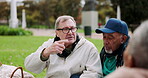 Park, picnic and elderly people talking while on grass together in the morning during retirement. Community, nature or spring with senior men and women chatting while sitting in a garden for bonding