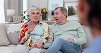 Senior couple on sofa, marriage counselling with psychologist and consultation with mental health professional for support. Therapist, old man and woman in therapy with conversation, advice and love.