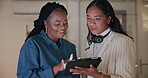 Women, tablet or manager in call center teaching telemarketing in customer services at night. Online, crm training or black woman mentor teaching a female agent for learning new job tasks in office 