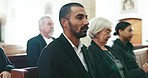 Sad, man and depression at a funeral in church for religious service and mourning. Grief, male person suit and burial with death, ceremony and grieving of chapel event of family member or friend