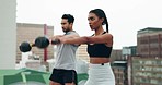 Exercise, people and rooftop with kettle bell, squats and workout in city outdoor. Personal trainer, strength training and motivation of a woman and man on a roof with sports and weight for fitness