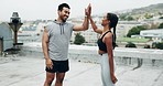 Couple, high five and fitness with exercise, outdoor or stretching legs with motivation, support or smile for goals. Man, woman and workout together for success, muscle or happy with teamwork in city