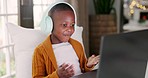 Headphones, laptop and kid student on a video call doing math counting for assignment, project or homework. Elearning, technology and young African child working on a computer for distance education.