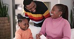 Happy, black family and cards for education, studying or teaching in a house. Laughing, together and an African mother, father and child with learning help, support and homework test together