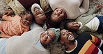 Portrait of grandparents, parents and children on floor for bonding, love and relationship together at home. Above of black family, grandma and grandpa with kids relax with mom and dad in living room