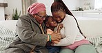 Happy family with grandparents, parents and girl on sofa for bonding, quality time and relax in living room. Playful mom, dad and senior people with child having fun on couch for fun, cuddle and love